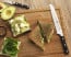 J.A. Henckels Zwilling Pro 8 in. Bread Knife pictured with food