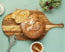 TeakHaus Paddle Style Bread & Serving Board in use