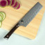 Shun Kanso 6.5 in. HG Nakiri displayed on cutting board