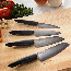 Kyocera Innovation Black 6'' Ceramic Chef's Knife Santoku shown with other Kyocera knives