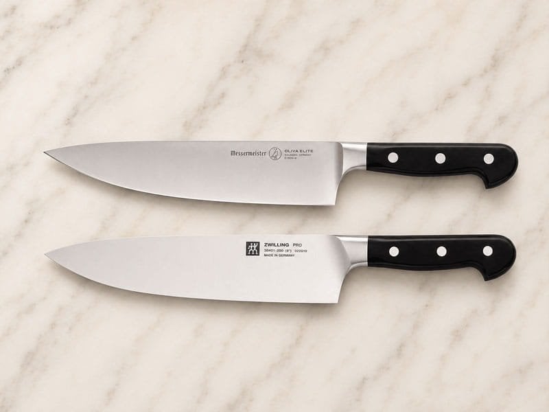 German chef knives from Messermeister and Zwilling displayed for comparison