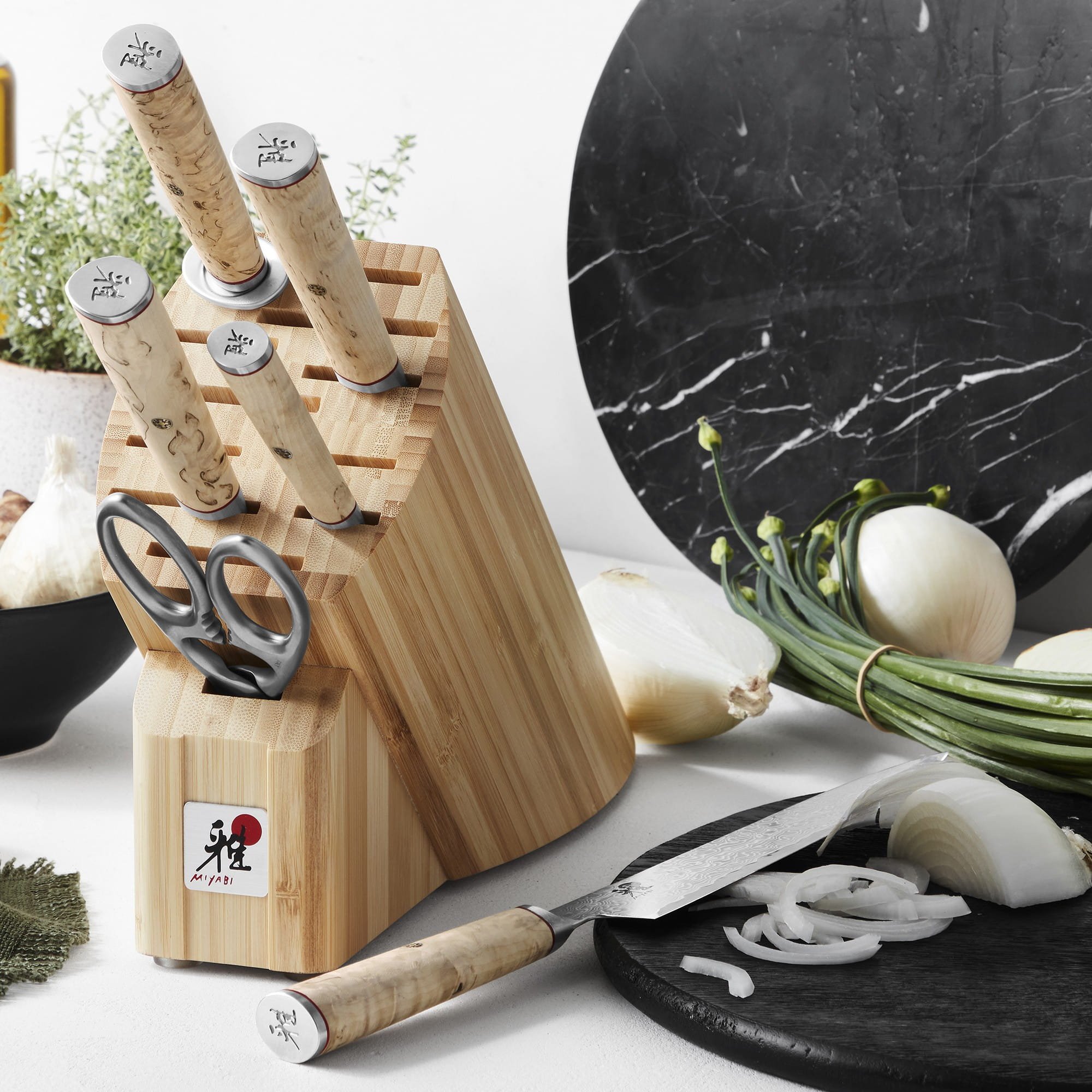 Miyabi Birchwood knife block set with shears on a kitchen counter