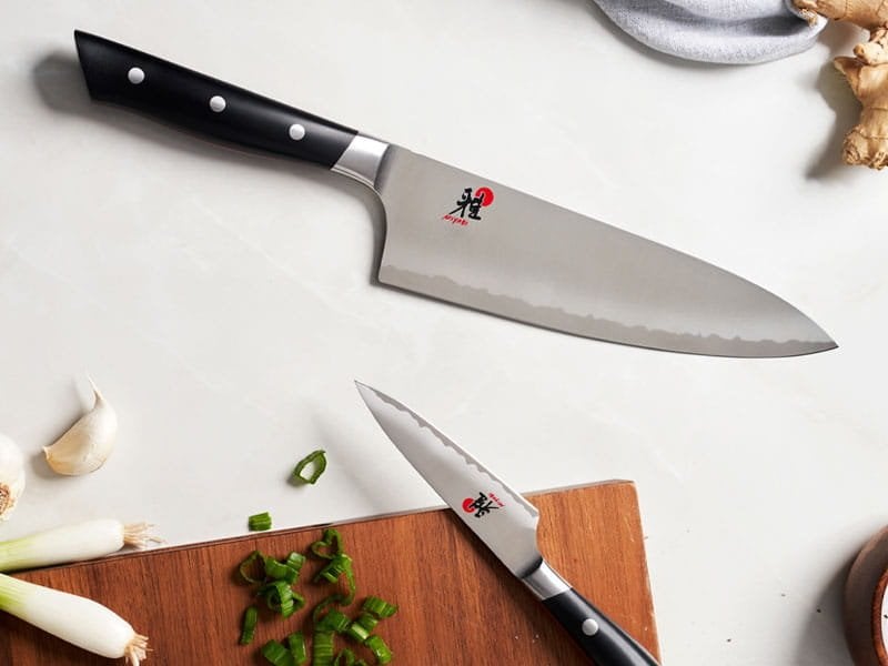A Miyabi Evolution knife with a classic three-rivet handle.