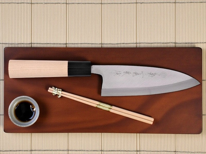 A traditional single-bevel deba yanagi knife for sushi.